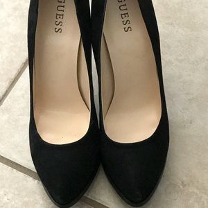 New black suede pumps